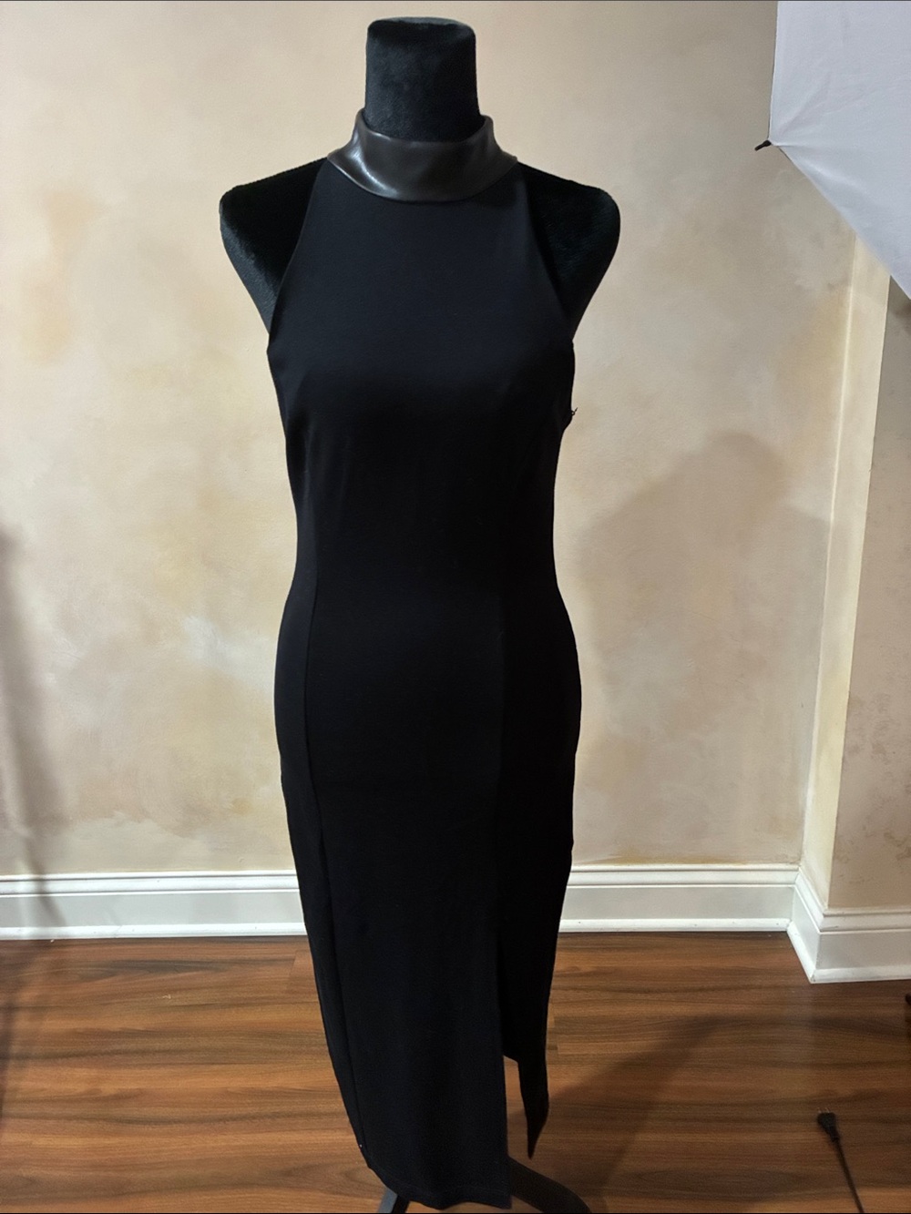 Sleeveless Black Midi Dress with Faux-Leather High Collar